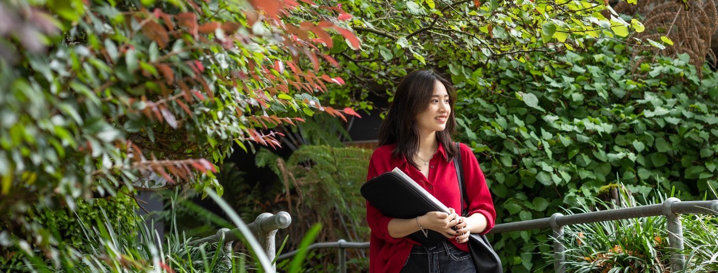 students in garden with trees