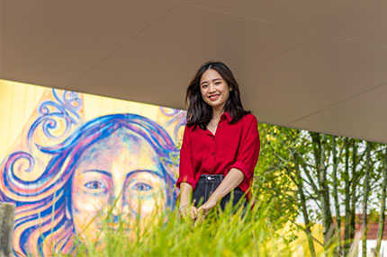 Student outside red shirt