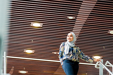 Student walking on stairs