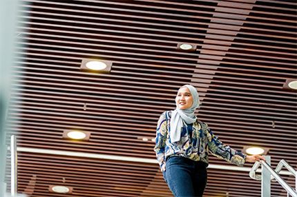 Student walking on stairs